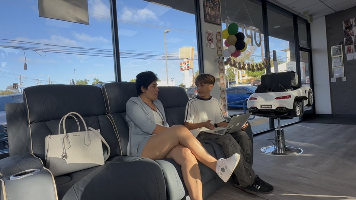 Meeting with a salon client, going over the site build together